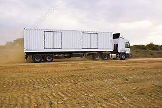 Heavy Goods in Transit via Dirt Roads