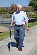 Grandpa walks at the park