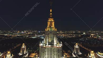 Moscow State University Main Campus and Illuminated Moscow Cityscape at Night. Russia. Aerial View