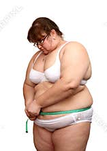Overweight woman measure her stomach
