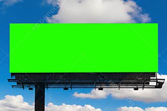 Empty billboard with chroma key green screen, on blue sky with c