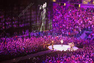 Band U2 playing in concert in Milan