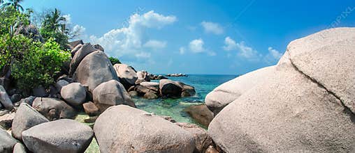 Beautiful tropical beach at exotic island with turquoise ocean w