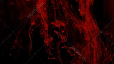 Red liquid swirls over black
