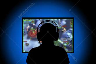 Silhouette,Young man playing video games on pc at home