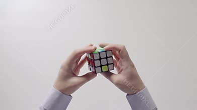 Businessman's hands solving puzzle. Part 02_02. Speed up.