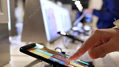 Motion of people playing on Samsung Galaxy S8 cellphone