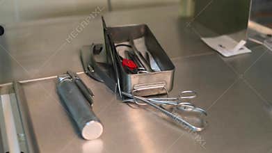 Tools surgeon on a metal table