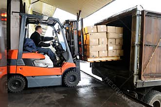 Forklift in warehouse