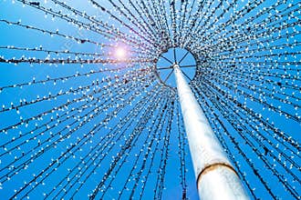 Light bulbs attach to a pole