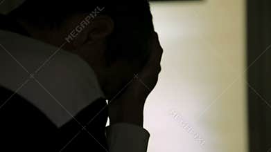 Thinking criminal man sitting alone, regret for past wrongs, review his actions