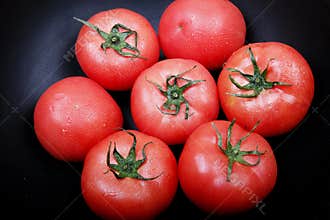 Tomato on black