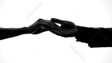 Male and female hands separating, relations breakup, divorce symbol, crisis