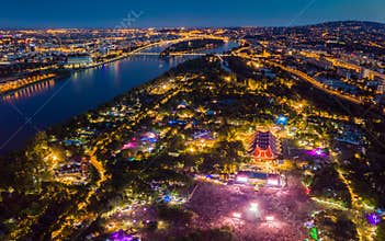 BUDAPEST, HUNGARY - AUGUST 12, 2018: Aerial panoramic view of Sziget Festival 2018 with the skyline of Budapest