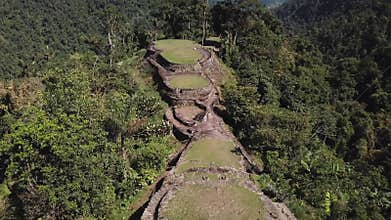 Drone flying over the ancient site Lost City in Colombia showing some tourists