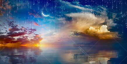 Amazing surreal background - crescent moon rising above sea