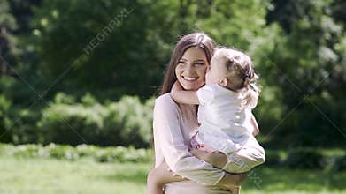 Mother And Daughter Spending Leisure Together In Nature
