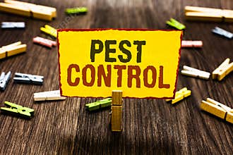 Handwriting text writing Pest Control. Concept meaning Killing destructive insects that attacks crops and livestock Clothespin hol