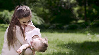 Mother And Daughter Spending Leisure Together In Nature