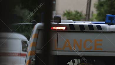 Medical car turning on the siren lights, doctors going to save lives, first aid