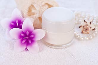 Cream tube with seashell and pearls