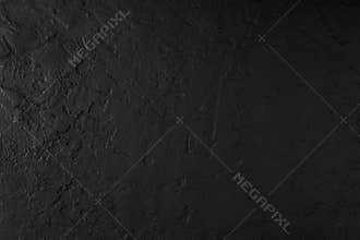 Black stone background, grey cement texture. Top view, flat lay.
