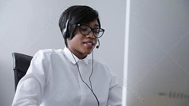 Customer Support. Afro-American Woman Working In Call Center