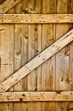 Wooden rustic barn door detail.