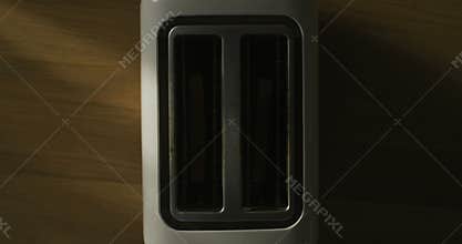 Top view of toaster bread popping out