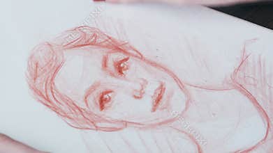 Woman artist drawing human sketch