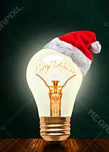 Merry Christmas Glowing Light Bulb With Santa Hat And Copy Space