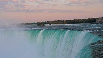 Dramatic sunset at horse shoe falls in Niagara Falls, Ontario, Canada.