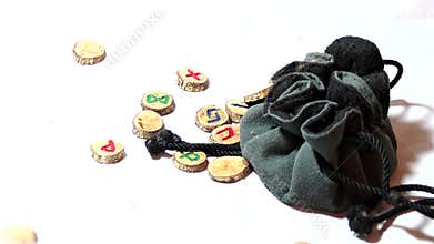Slow shutter runes with bag and copy space on white