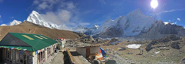 Beautiful weather at Gorak Shep with Nepalese guest houses and snow capped Himalayan range in the background
