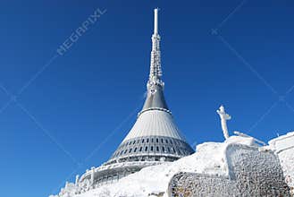 TV transmitter and mountain hotel JeÅ¡tÄ›d in winter