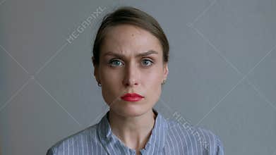 Portrait of woman shocked and upset, to hear the sad news
