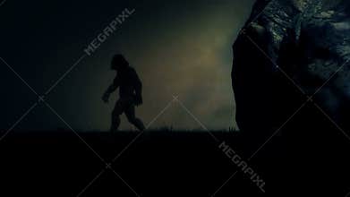 A caveman stepping out of his cave on a stormy night