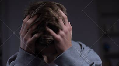 Depressed teenager suffering emotional problems, strong headache, disappointment