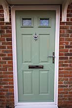 Green door. Modern house composite UPVC front door