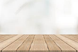 Empty wood table top on white blurred background