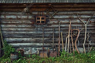 Wooden barn wall texture and farming tools