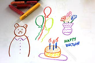 Drawing with crayons - a birthday of a bear, cake with candles, balloons, flowers
