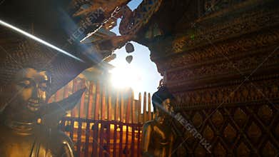 4K footage. golden buddha statue in sunlight at Wat Phra That Doi Suthep temple, Chiang Mai, Thailand. Wat Phra That Doi Suthep is