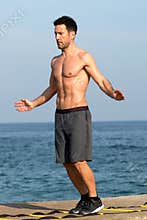 training on agility ladder by the sea