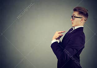 Surprised man pointing fingers at himself denies responsibility and accusations
