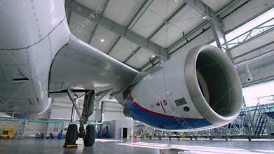 Engine of the airplane under heavy maintenance. Engine of modern passenger jet plane. Front view. Aircraft air intake
