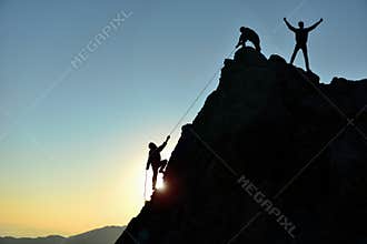 Rock climbing struggle and peak success