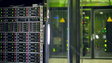 Big server racks at modern data center. Internet technology concept. 4K.