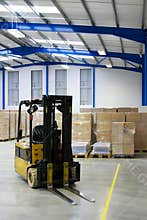 Warehouse interior and forklift