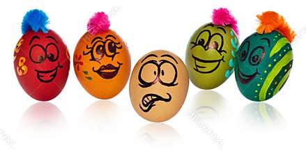 Easter eggs, painted in smiling and terrified cartoon faces look